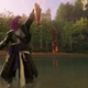 A character triumphantly displays a caught fish in Amazon's New World MMO.